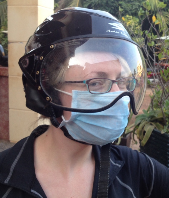 BK-C prepares to operate. Everywhere in SE Asia, people wear surgical masks. Mostly to protect them from the dust or smog when they're riding their mopeds - or in Vietnam, where there's a big line in leopard print surgical masks, just for fashion.