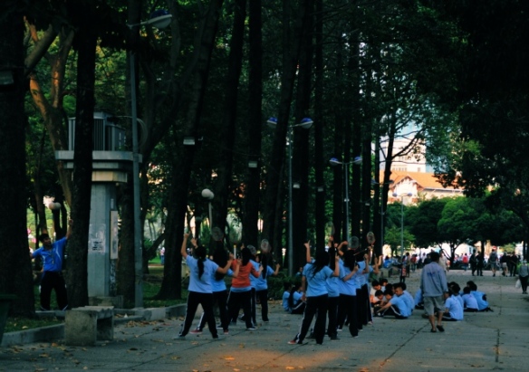 School children practice badminton in a park in HCMC. Badminton is big out here - it's common for courts to be marked on the streets. Perhaps the absence of mopeds driving across the court at the 2012 Olympics is why Vietnam's one Olympian badminton player failed to advance past the elimination rounds.