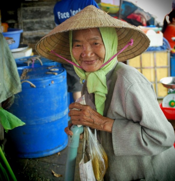A Vietnamese lady doing her daily produce shop. The marvel is that I saw ladies like this also crossing the road unscathed in HCMC.