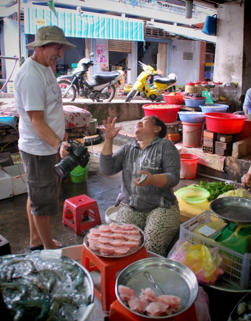 A member of our tour group is a hit with the local women.